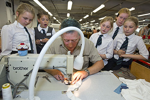 Pupils from Crich Junior School watch a sewing demonstration