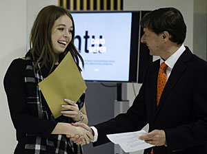 Laura Oliver receives her prize from Christopher Nieper. Photo © Georgina Godfree